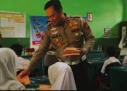 Peduli Pendidikan, Satlantas Polresta Bogor Kota Bagikan Buku Dan Alat Tulis Kepada Murid SDN Panaragan Kidul