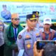 pembagian air bersih ini merupakan upaya Polri membantu masyarakat yang membutuhkan akses air bersih (foto: Fathar)