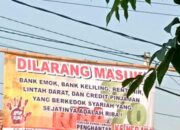 Bikin Resah, Warga Tambelang Bekasi Pasang Spanduk ‘Bank Emok, Bank Keliling dan Rentenir Dilarang Masuk’