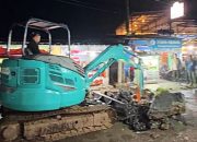 Kapolres Condro Kirim Excavator Atasi Perkampungan di Pamarayan Serang Banten Tergenang Banjir