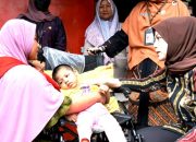 Ketua TP PKK Kota Cilegon Alfi Robinsar Serahkan Bantuan Kursi Roda kepada Penyandang Disabilitas